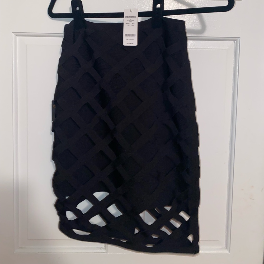BEBE caged black skirt- size S